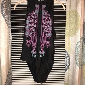 Zip up swimsuit embroidered design. Just too small